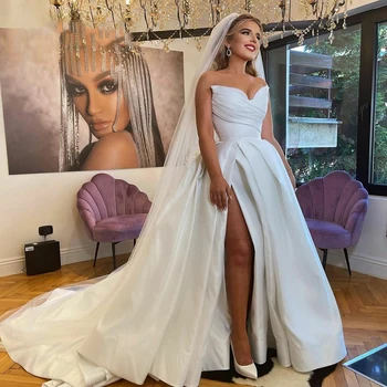 שמלת הכלה סאטן קפלים סטרפלס A-Line שמלות כלה 2022 סקסי צד פיצול זמן הרכבת הנסיכה חתונה שמלת נשף